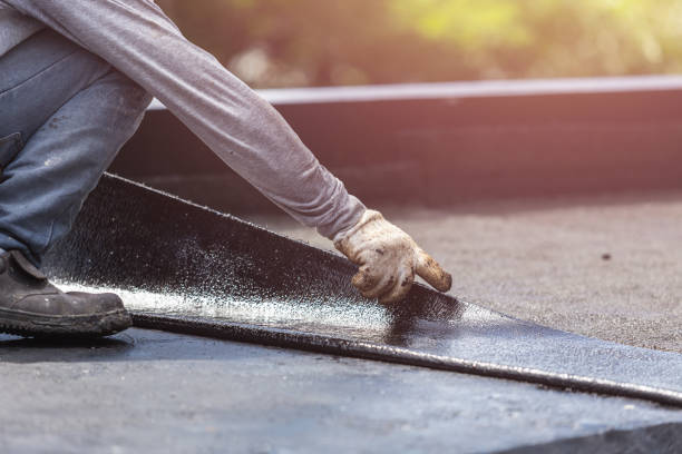 Professional Waterproofing technician working in Brunswick, NC